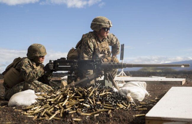 Photo: Soldier fires an M2 .50 caliber machine gun