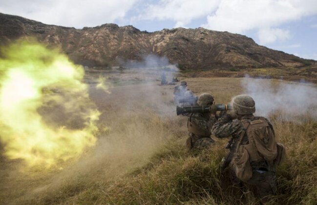 Photo: Marine fires an AT4 rocket launcher a during a combined arms exercise at the Kaneohe Bay Range Training Facility