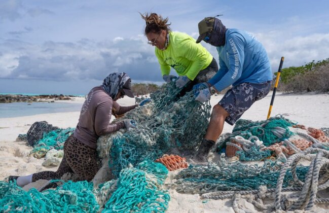 Photo: PMDP members gather fishing nets