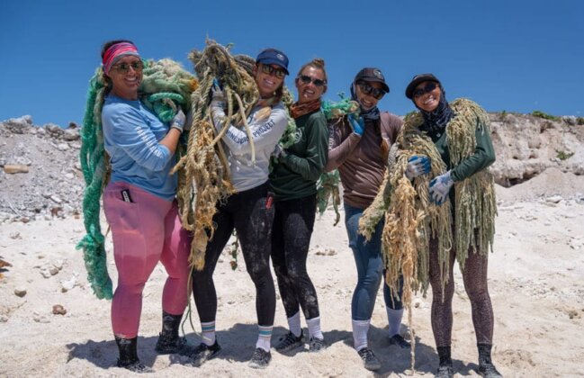 Photo: NOAA team members with fishing nets