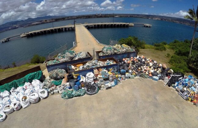 Photo: NOAA Marine Debris Project shows off their collection of marine debris