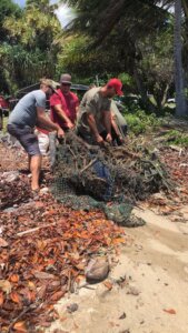 Photo: Members of Sustainable Coastlines Hawaiʻi helped Laʻa Poepoe remove tons of marine debris from the fishpond